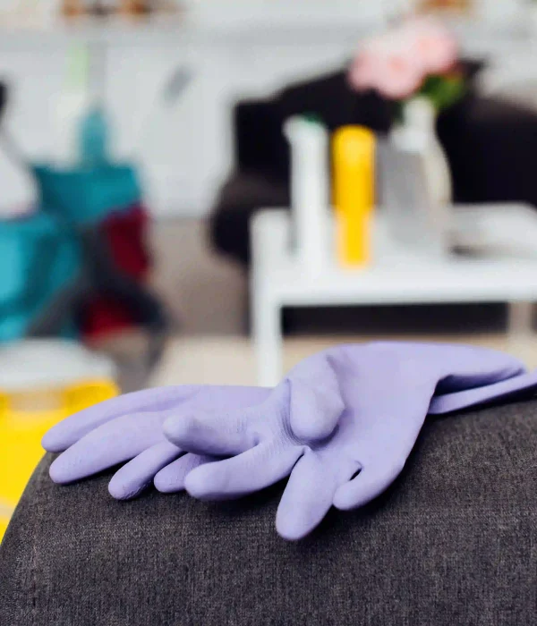 close-up-of-rubber-gloves-on-sofa-with-blurred-bac-2026-01-05-23-49-54-utc