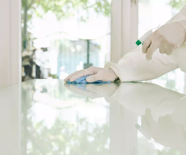 worker-in-rubber-gloves-wiping-surfaces-2026-01-07-07-05-28-utc
